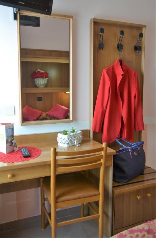 Postel nebo postele na pokoji v ubytování Hotel Facioni