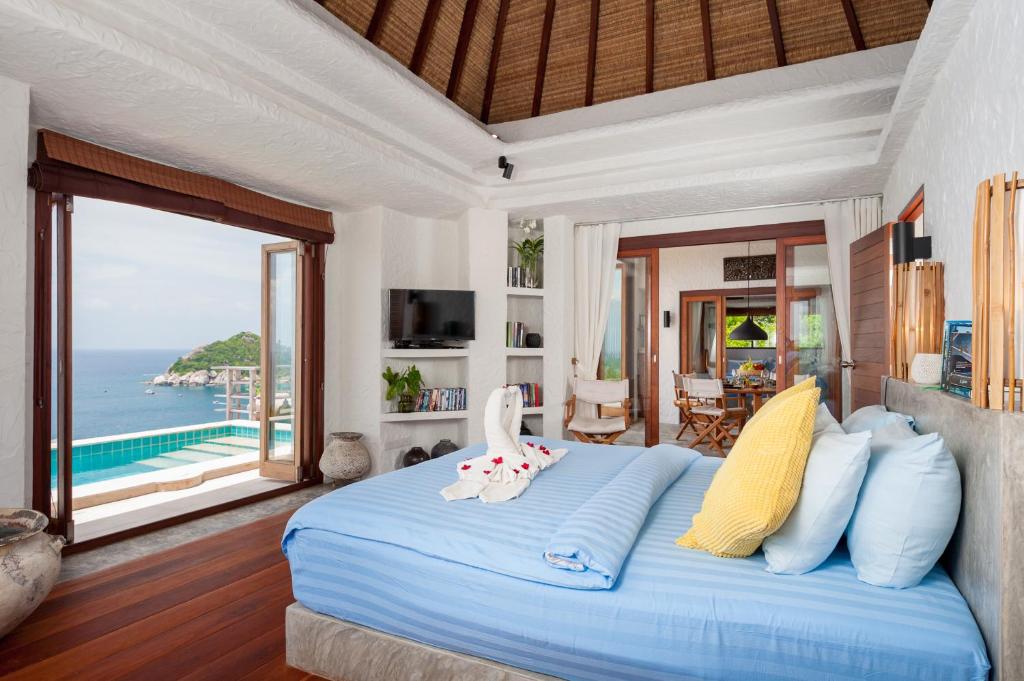 Postel nebo postele na pokoji v ubytování Cape Shark Villas
