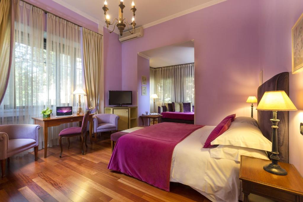 TV a/nebo společenská místnost v ubytování Hotel Fenix