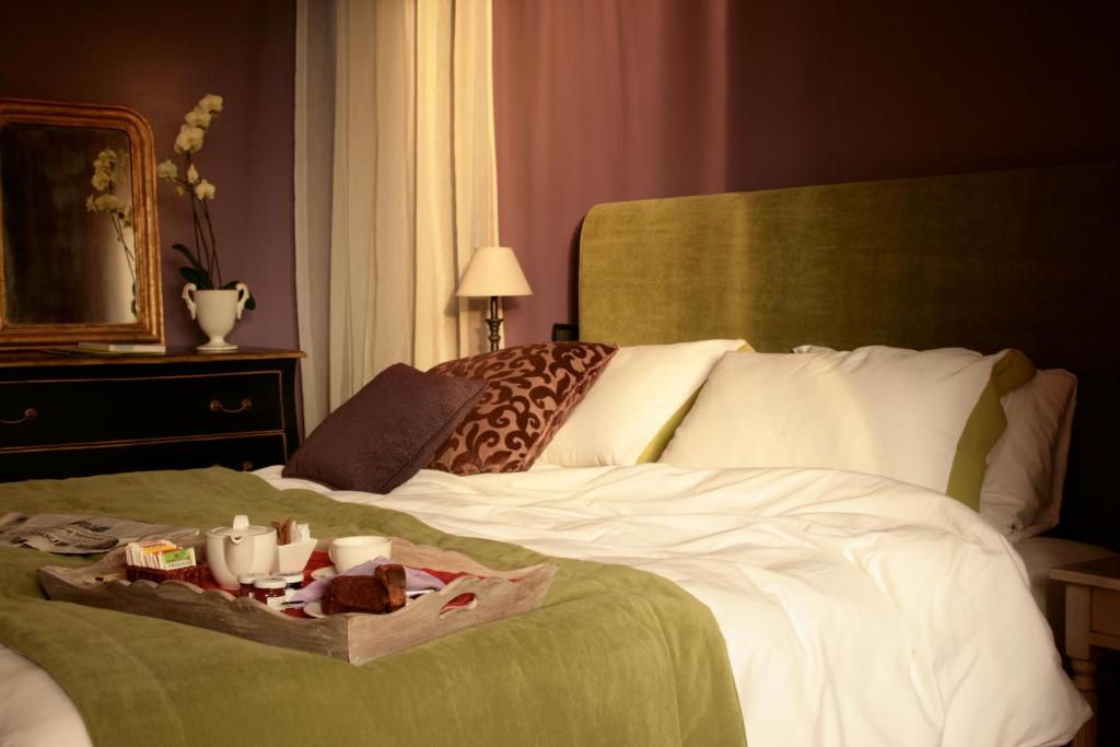 Postel nebo postele na pokoji v ubytování Hotel Fenix