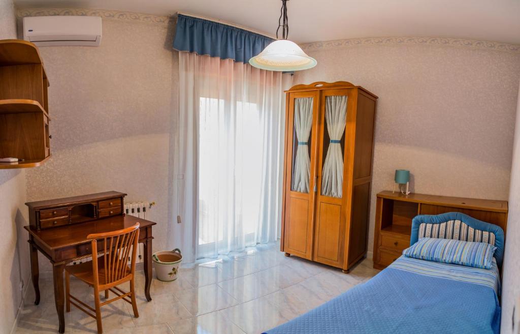 Postel nebo postele na pokoji v ubytování B&b Cortile Aurora
