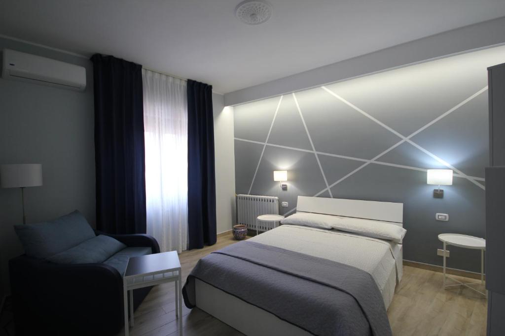 Postel nebo postele na pokoji v ubytování B&b Cortile Aurora