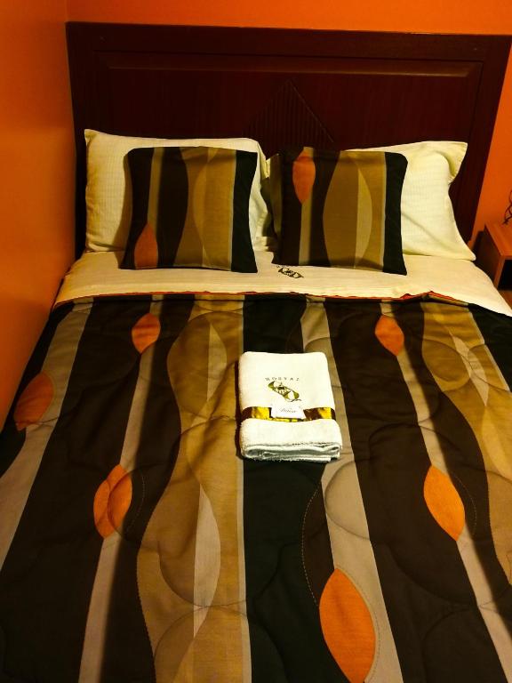 Postel nebo postele na pokoji v ubytování Hostal GQ