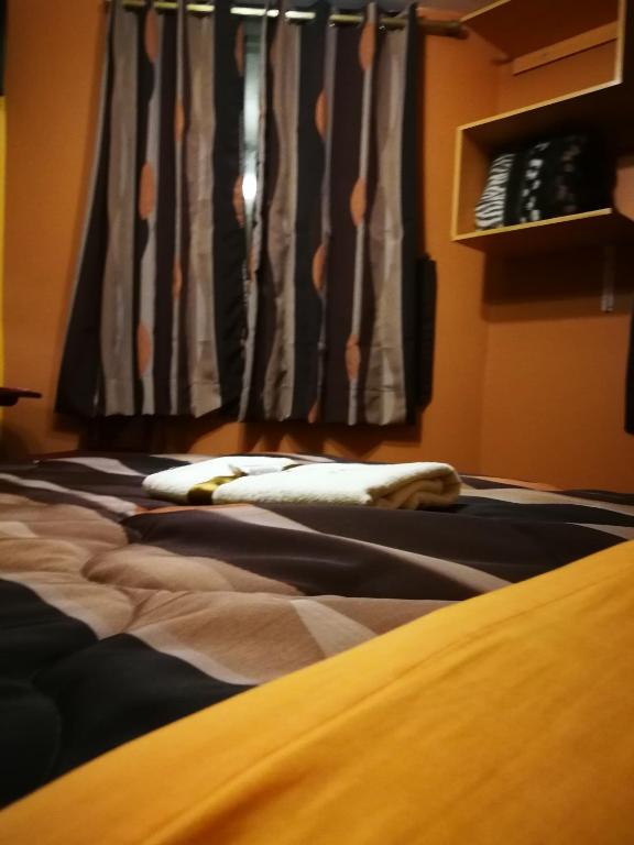 Postel nebo postele na pokoji v ubytování Hostal GQ