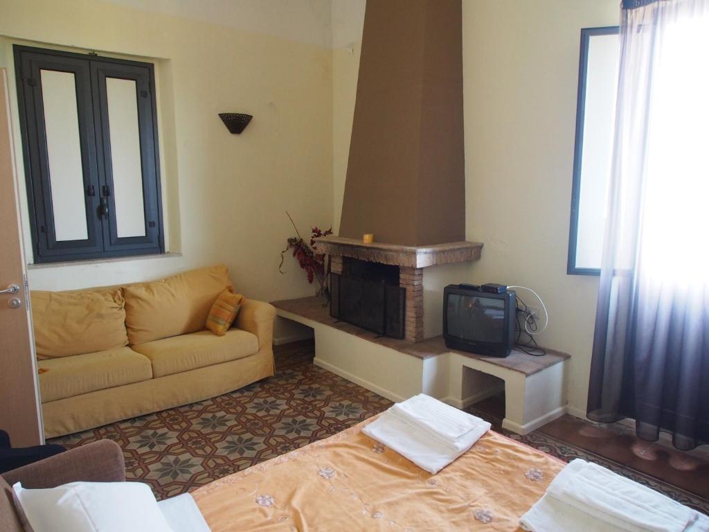 Posteľ alebo postele v izbe v ubytovaní Casavacanze Residence Maia Volcani