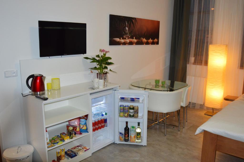 TV a/nebo společenská místnost v ubytování Vila Lípa