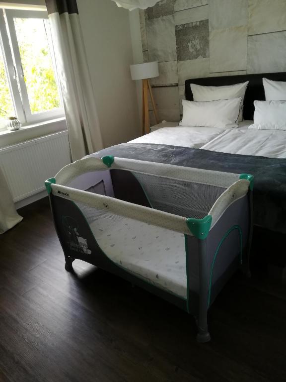 Postel nebo postele na pokoji v ubytování Appartment Fasanenhof Klinikum und Uni nah mit Netflix