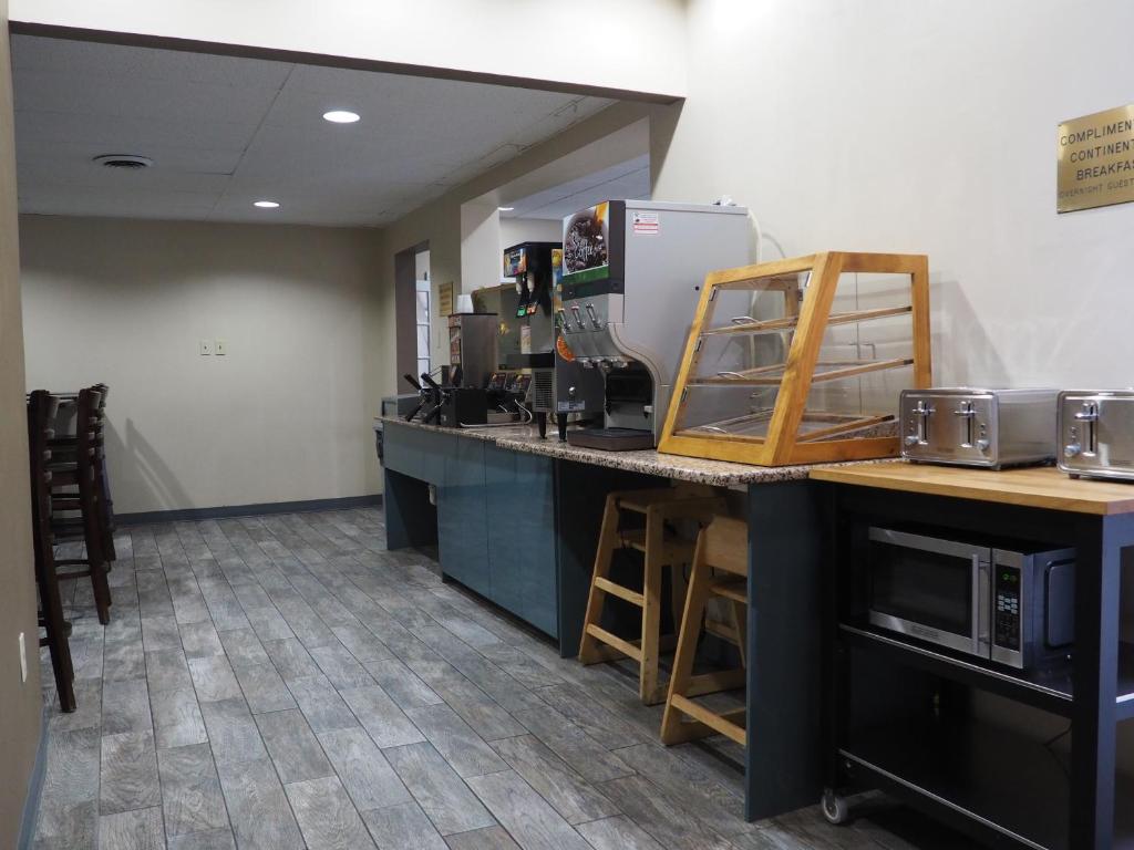 a kitchen with a counter top with a appliance at Parkview Inn and Conference Center in Allentown
