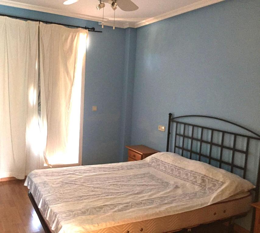 Postel nebo postele na pokoji v ubytování Apartamentos Azahar