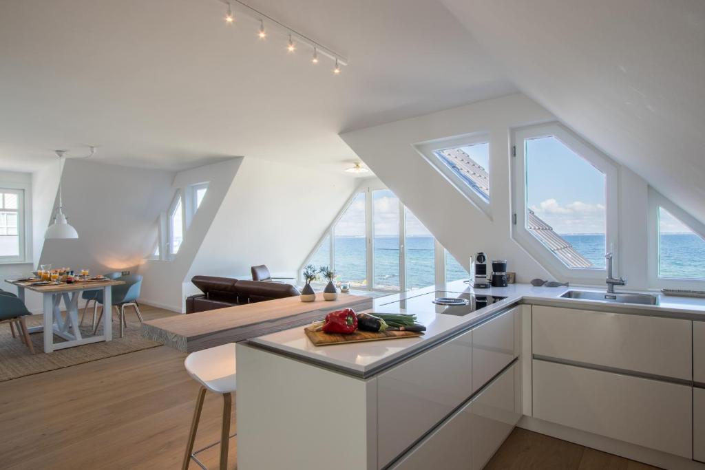 Kuchyň nebo kuchyňský kout v ubytování Strandhaus Niendorf