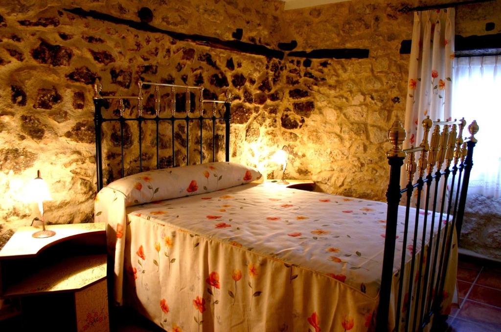En eller flere senge i et værelse på Casa Rural Valle Esgueva