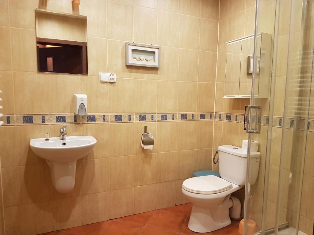 Kúpeľňa v ubytovaní Pokoje Adriano