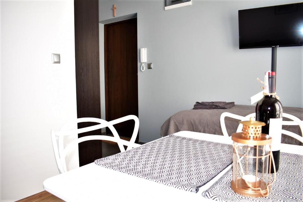 Televízia a/alebo spoločenská miestnosť v ubytovaní Apartament Fibra Cortado