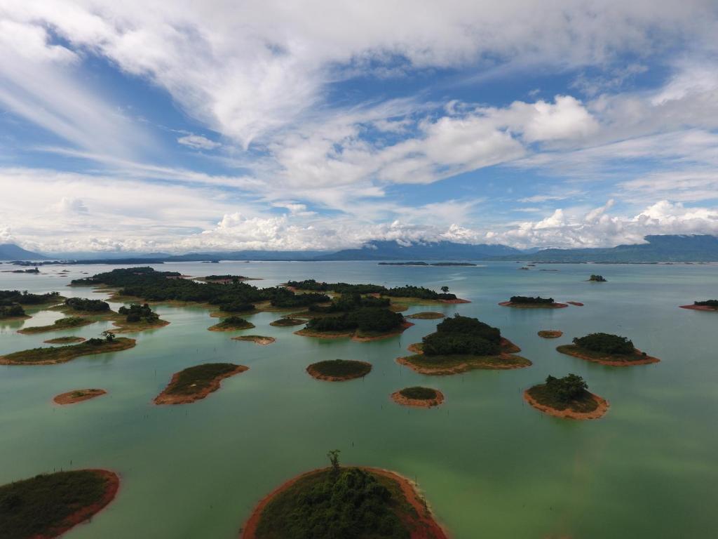 an aerial view of islands in the water at Dansavanh Namngum Resort in Ban Keun