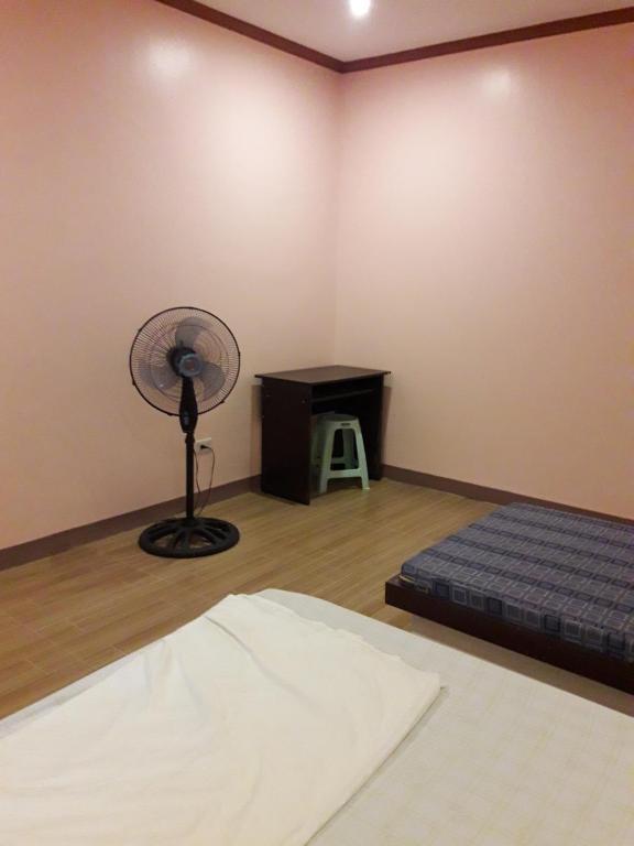 Postel nebo postele na pokoji v ubytování cubby's guesthouse
