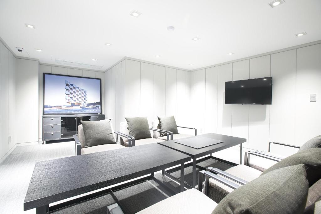 TV a/nebo společenská místnost v ubytování Hotel Ora Incheon