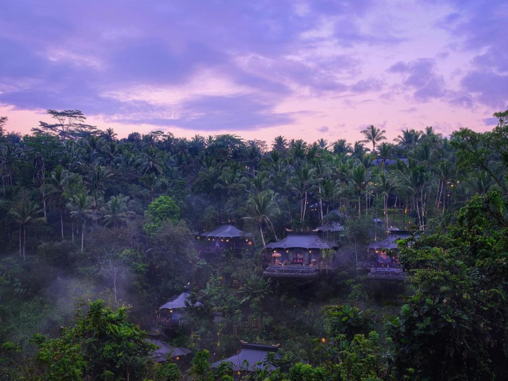 an aerial view of a resort in the jungle at Capella Ubud, Bali in Ubud