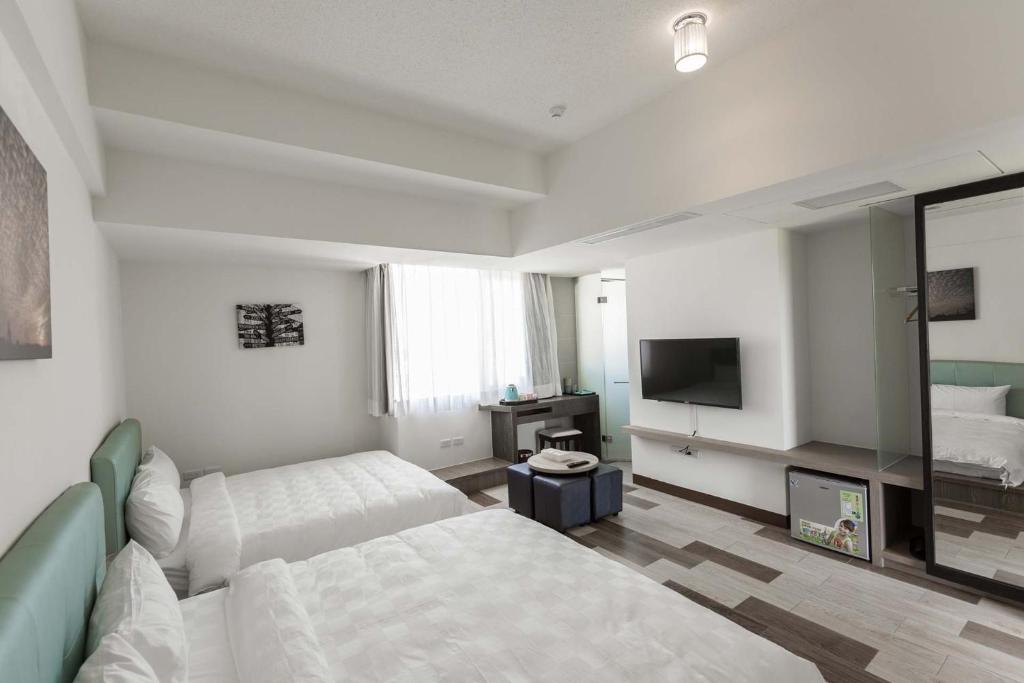 TV a/nebo společenská místnost v ubytování Tien Hsiang Lin Sea Dragon King Hotel