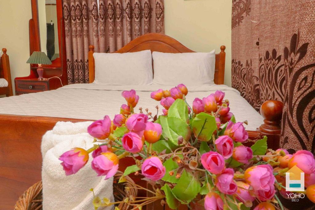Postel nebo postele na pokoji v ubytování Paradise Cottage