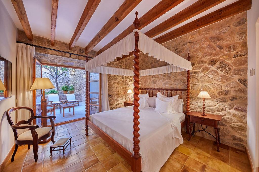 Cama o camas de una habitación en Cas Comte Suites & Spa - Adults Only