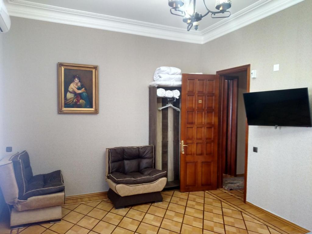 TV a/nebo společenská místnost v ubytování Hotel Villa