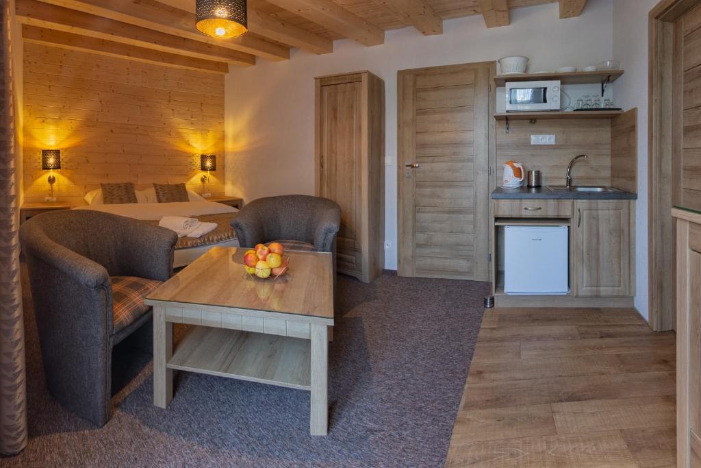 Kuchyň nebo kuchyňský kout v ubytování Apartmány a Štúdia Villa Flora