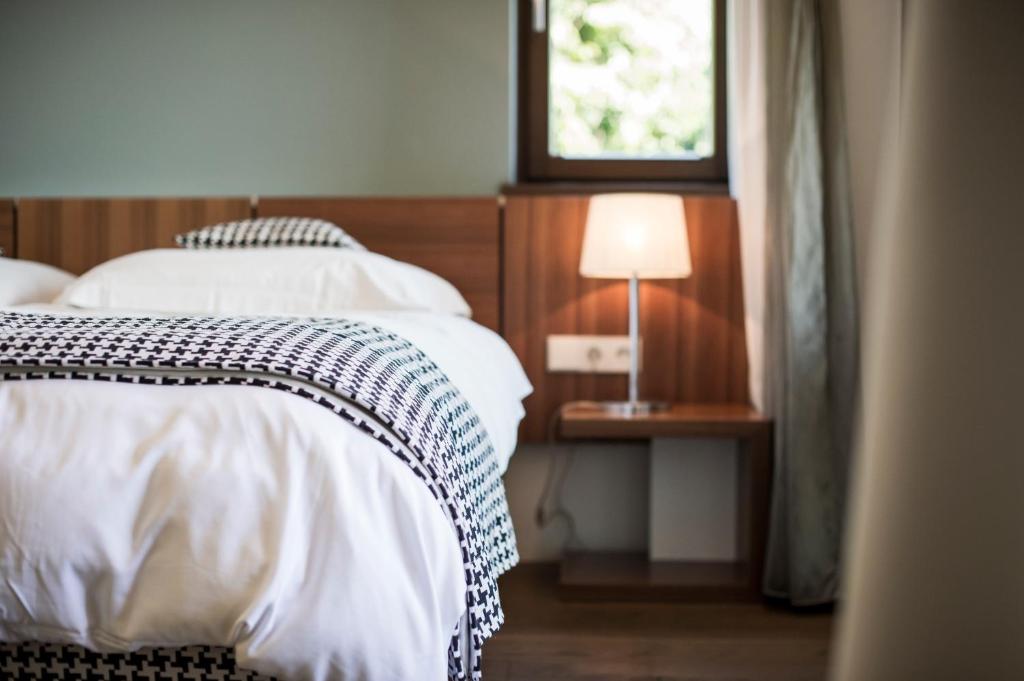Postel nebo postele na pokoji v ubytování Designhotel Gius La Residenza