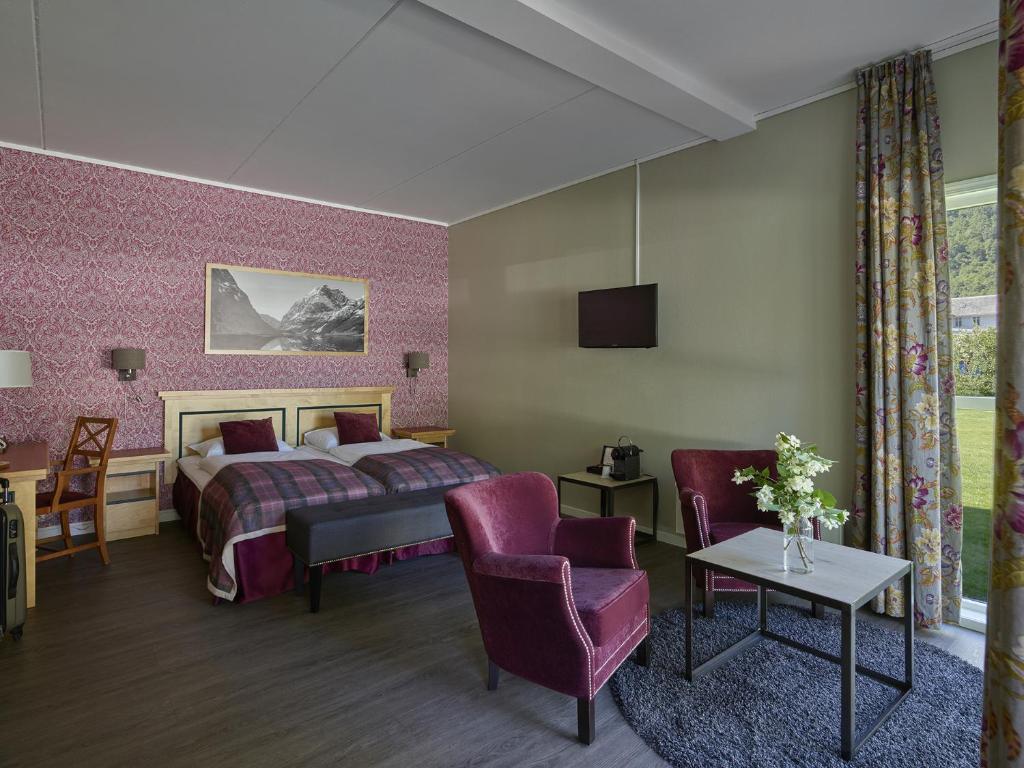 TV a/nebo společenská místnost v ubytování Fretheim Hotel