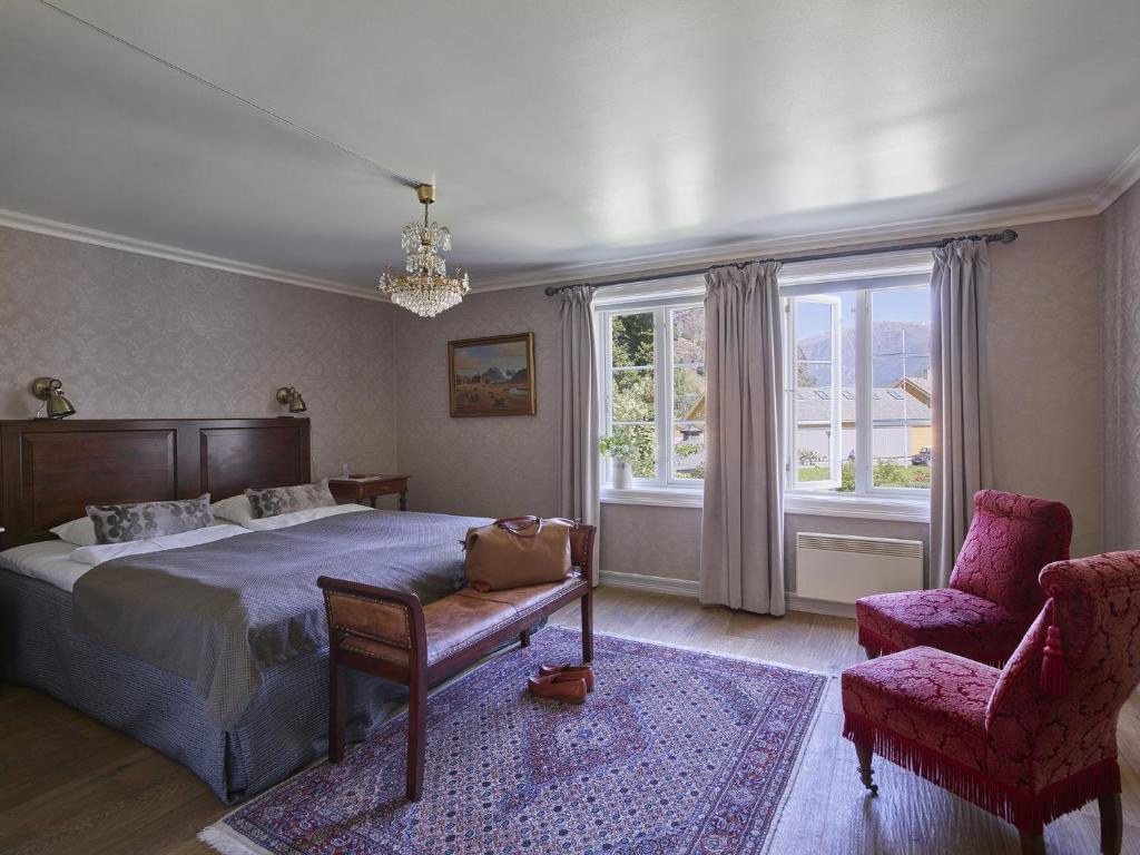 Postel nebo postele na pokoji v ubytování Fretheim Hotel