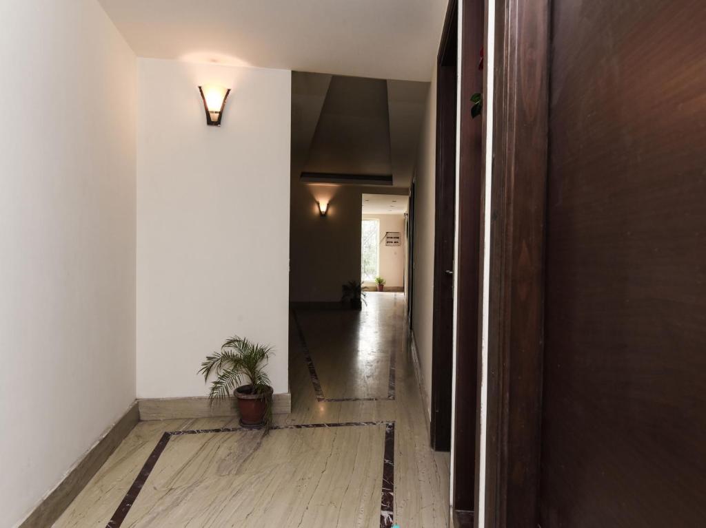 TV a/nebo společenská místnost v ubytování Hotel Haris MG Road Gurugram