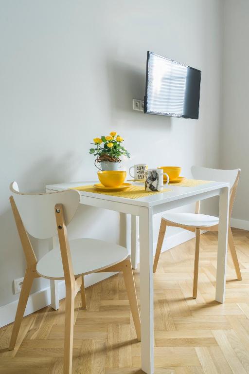 Televízia a/alebo spoločenská miestnosť v ubytovaní 3V Apartments