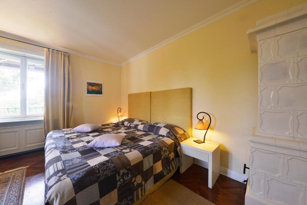 Postel nebo postele na pokoji v ubytování Hotel Villa Astra