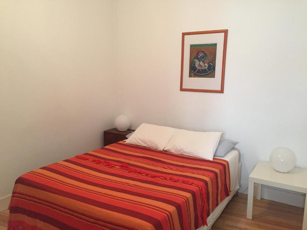 Postel nebo postele na pokoji v ubytování Se de Lisboa I