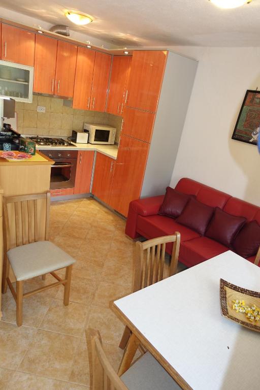 Kuchyň nebo kuchyňský kout v ubytování Dragica Apartments