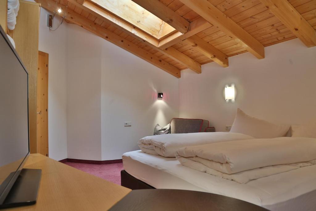 Posteľ alebo postele v izbe v ubytovaní Alp Larain B&B