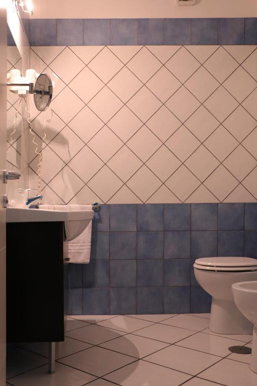 Koupelna v ubytování Hotel Ancora