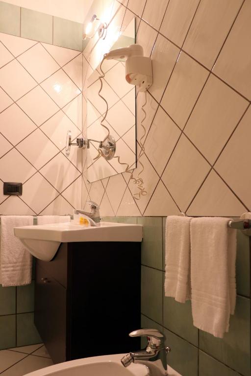 Koupelna v ubytování Hotel Ancora