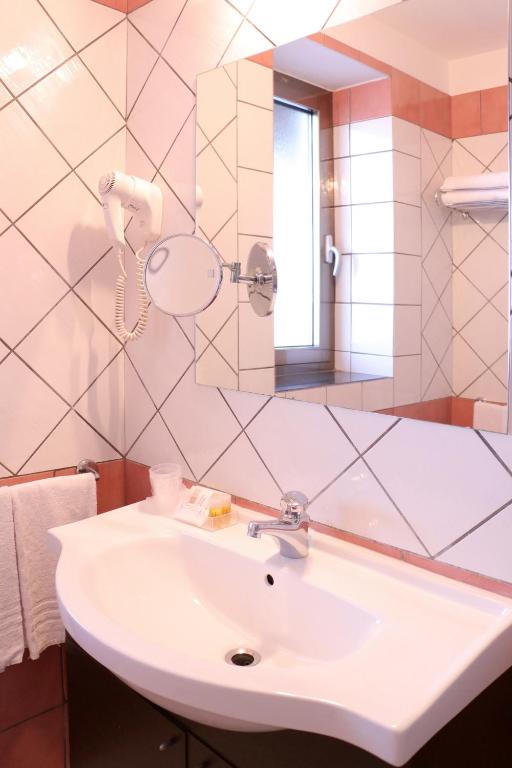 Koupelna v ubytování Hotel Ancora