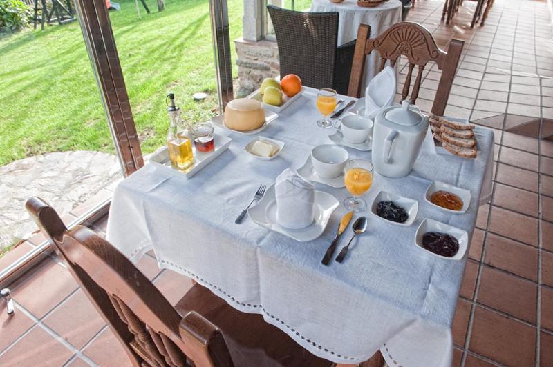 Un restaurante o sitio para comer en Casa de Trillo