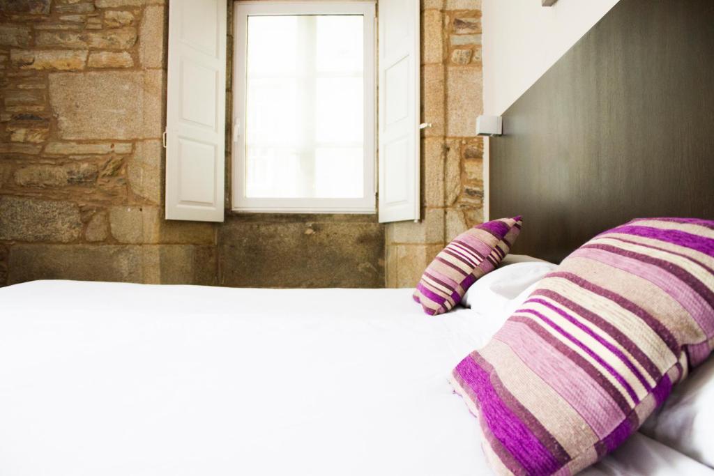 Cama o camas de una habitación en Hotel A Tafona do Peregrino