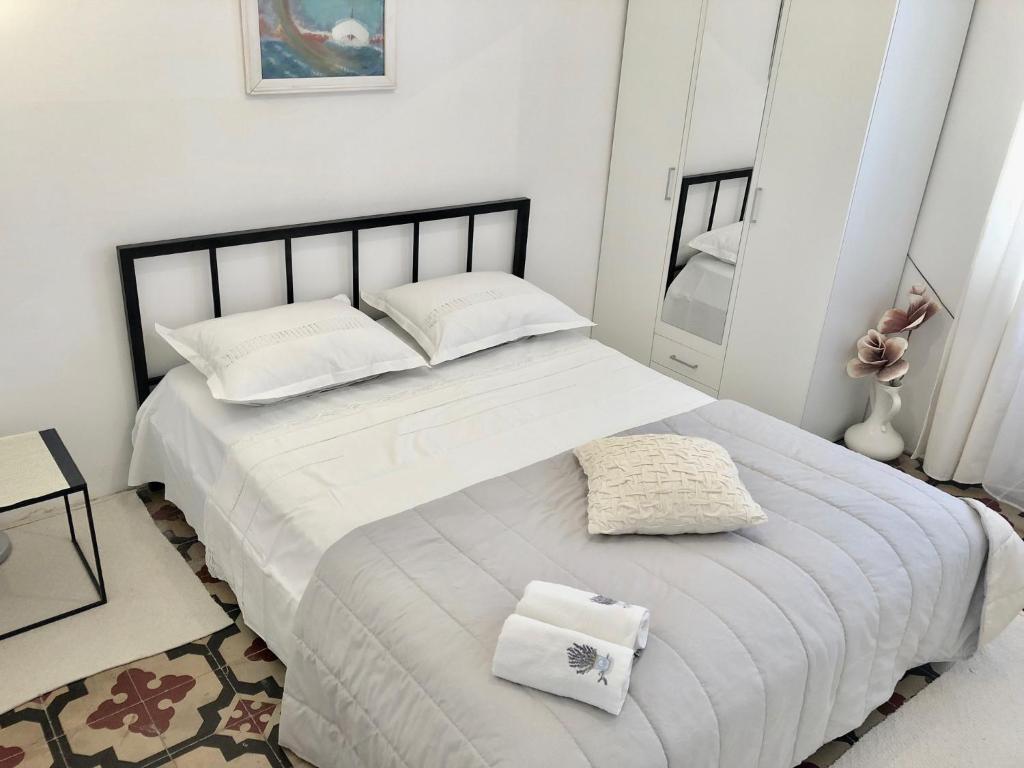 Postel nebo postele na pokoji v ubytování Apartment Mamma Mia 2