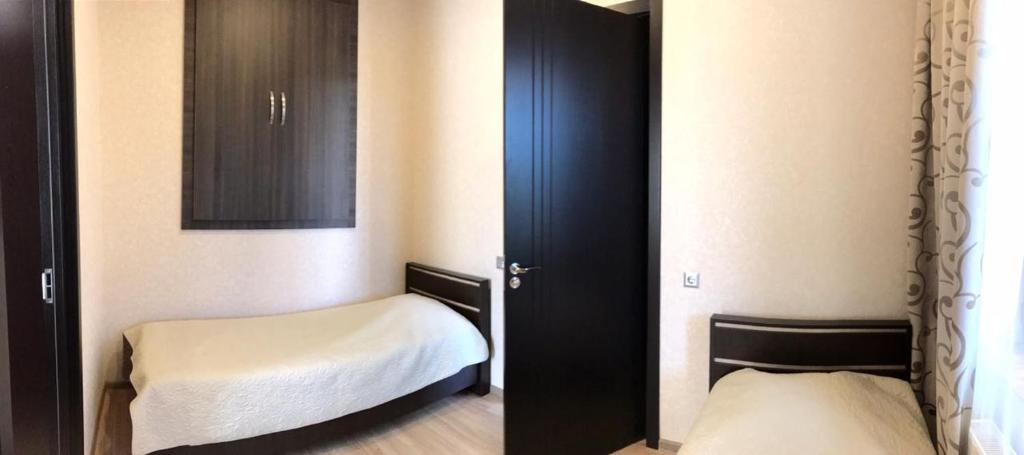 Postel nebo postele na pokoji v ubytování Guest House Kakheti