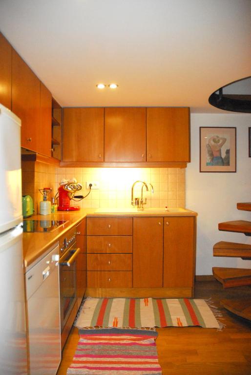 Kuchyň nebo kuchyňský kout v ubytování Luxurious Loft with Jacuzzi
