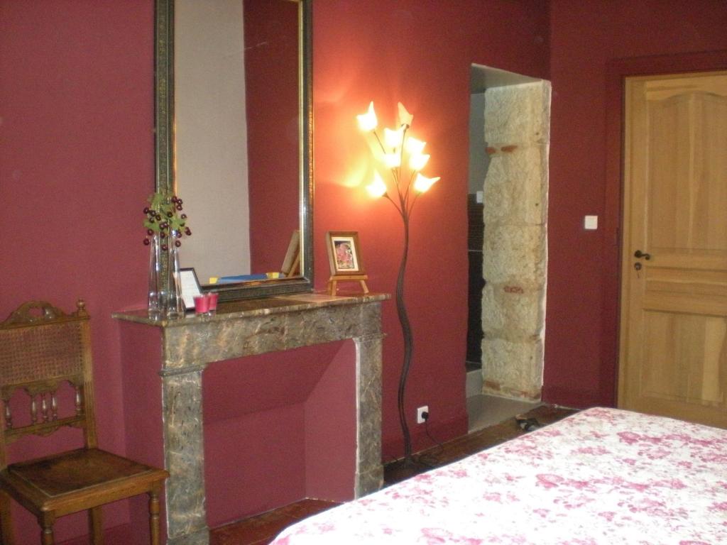Postel nebo postele na pokoji v ubytování Manoir Larcouillet