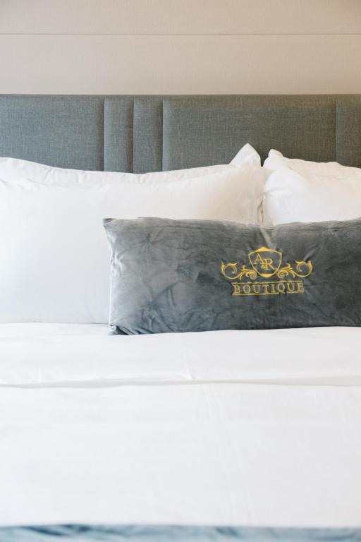 Postel nebo postele na pokoji v ubytování A&R Boutique Hotel