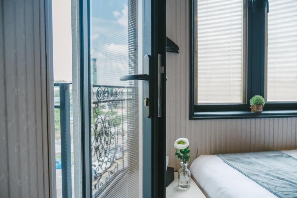 Postel nebo postele na pokoji v ubytování A&R Boutique Hotel