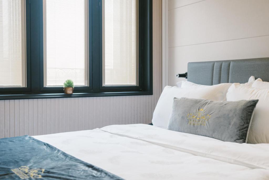 Postel nebo postele na pokoji v ubytování A&R Boutique Hotel