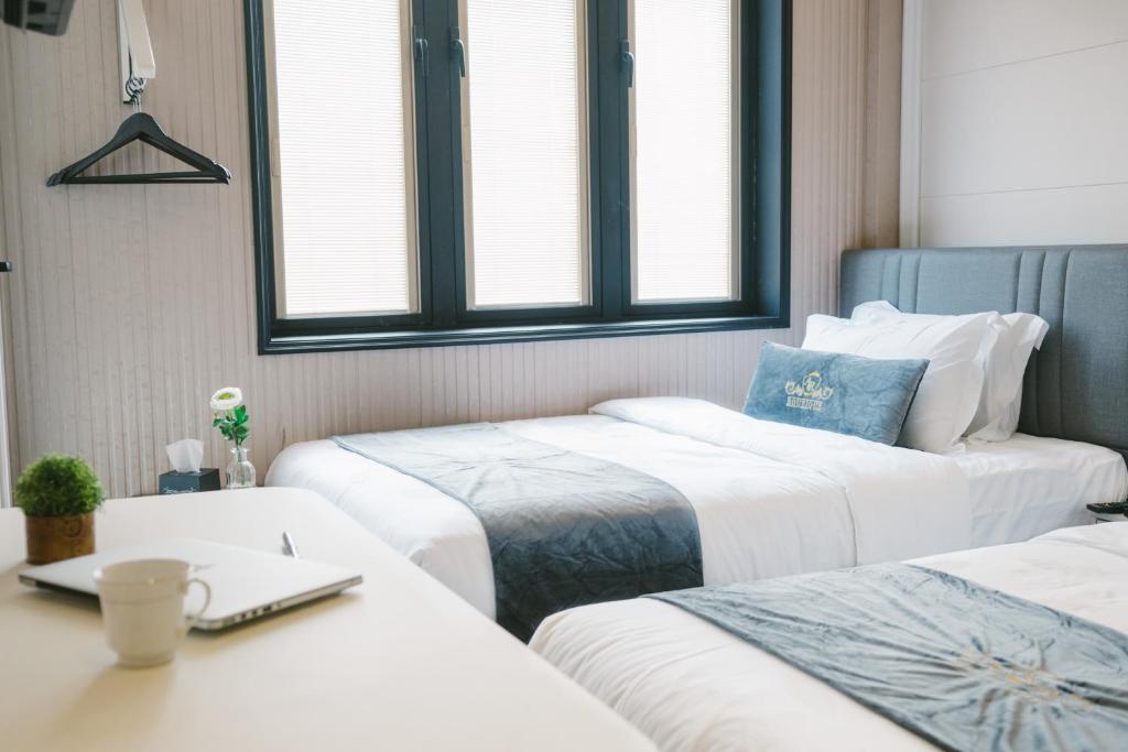 Postel nebo postele na pokoji v ubytování A&R Boutique Hotel
