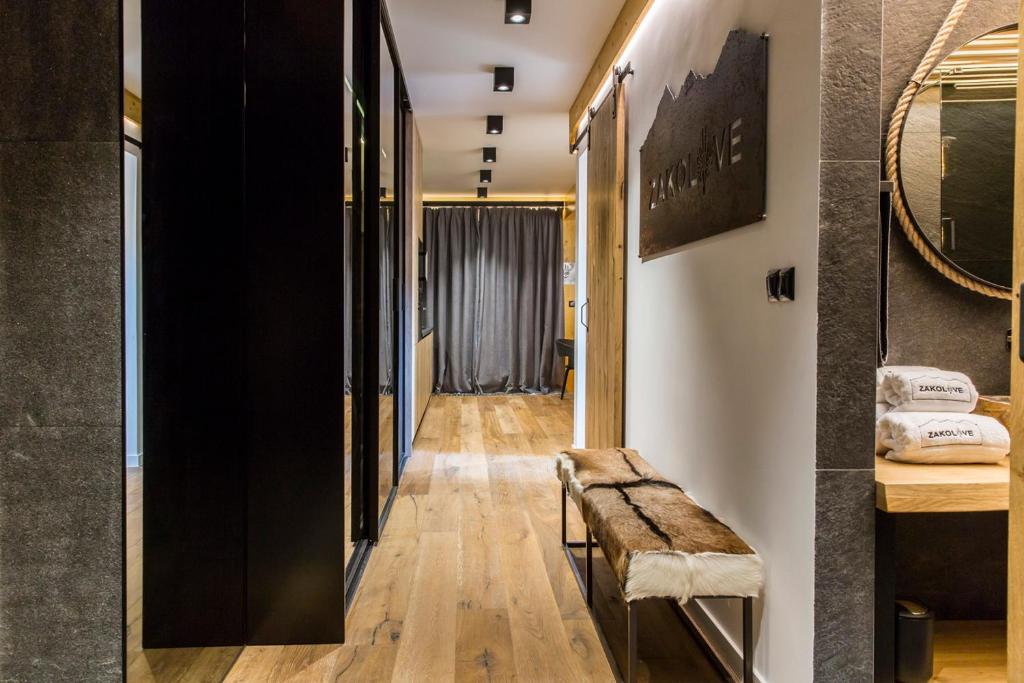 Posteľ alebo postele v izbe v ubytovaní Apartament ZAKOLOVE pod Skocznią - Sauna , Jaccuzi , piękny taras