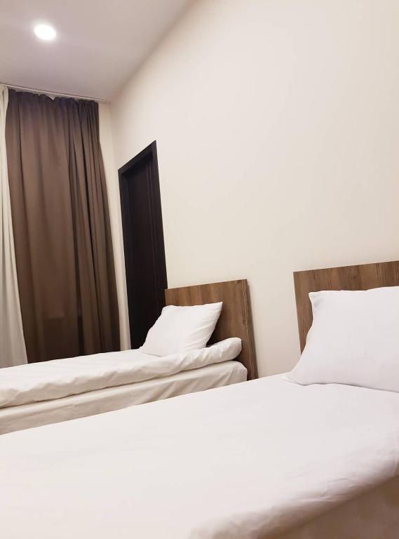 Postel nebo postele na pokoji v ubytování Hotel Classic